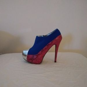 Stilletto platform heels. Height - 5 1/2 inches.